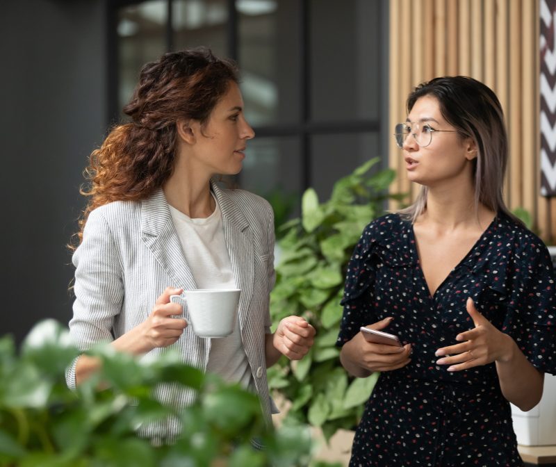 employees talking on stairway